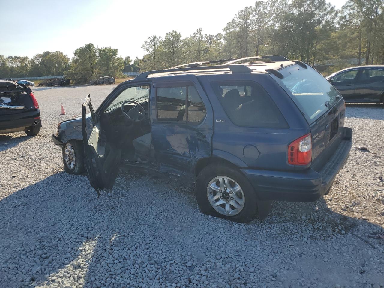 2002 Isuzu Rodeo VIN 4S2CK58W124307433 Copart auction photo, side damage thumbnail 2