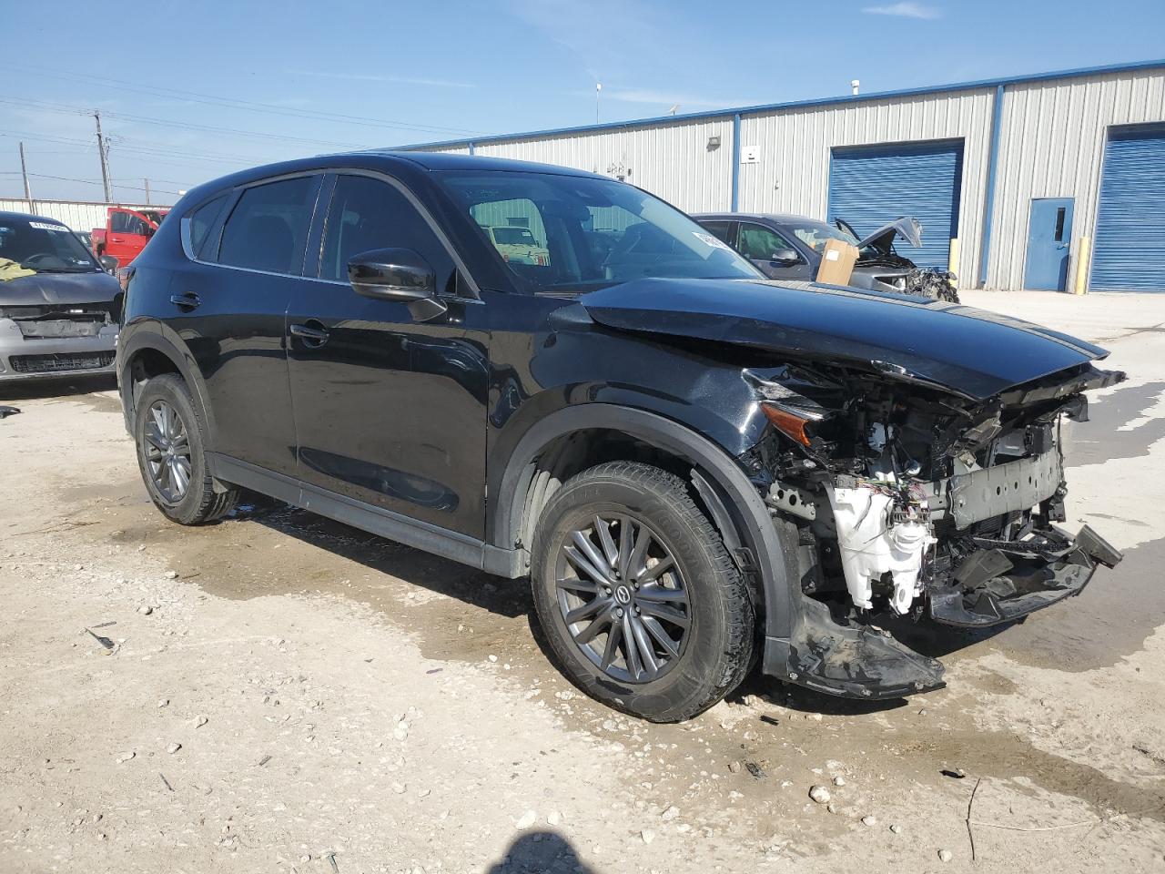 2020 Mazda CX-5 VIN JM3KFABM9L0729042 Copart auction photo, front end / minor dent/scratches damage thumbnail 4