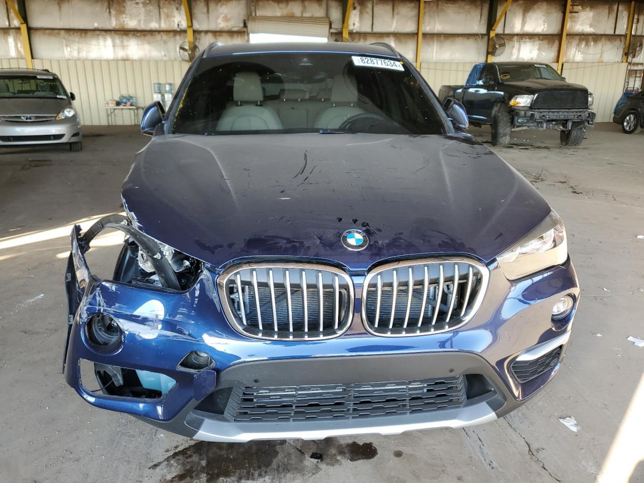 2019 BMW X1 VIN WBXHU7C57K3H46055 Copart auction photo, front end damage thumbnail 5