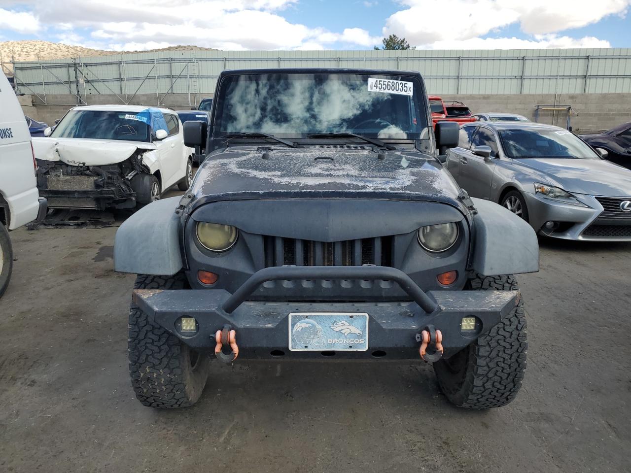 2011 Jeep Wrangler VIN 1J4BA3H19BL523176 Copart auction photo, rear end damage thumbnail 5