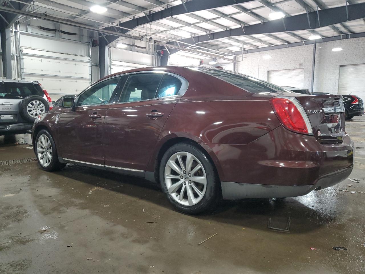 2009 Lincoln MKS VIN 1LNHM94R89G613780 Copart auction photo, side damage thumbnail 2
