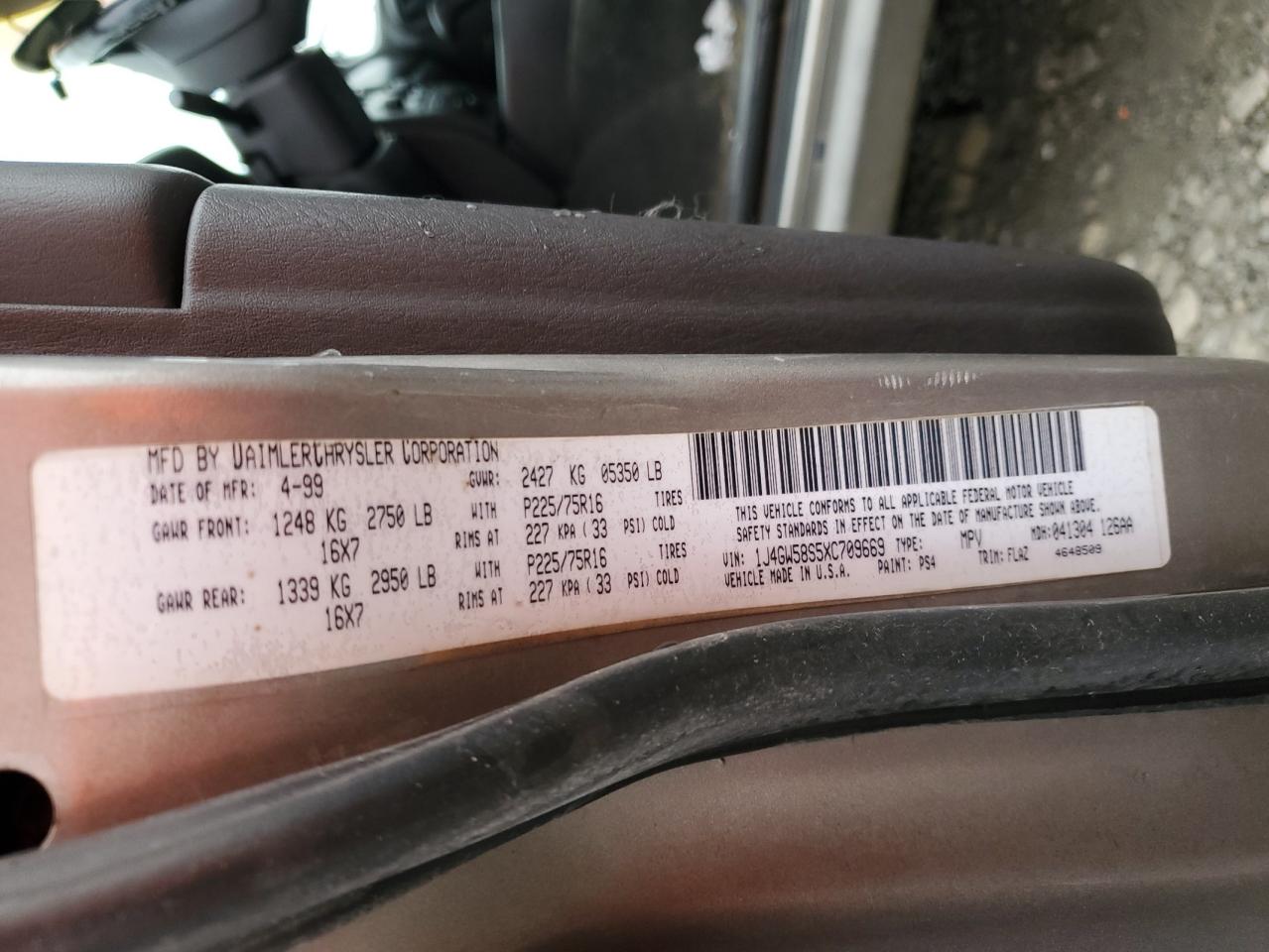 1999 Jeep Grand Cherokee VIN 1J4GW58S5XC709669 Copart auction photo, rear end damage thumbnail 13