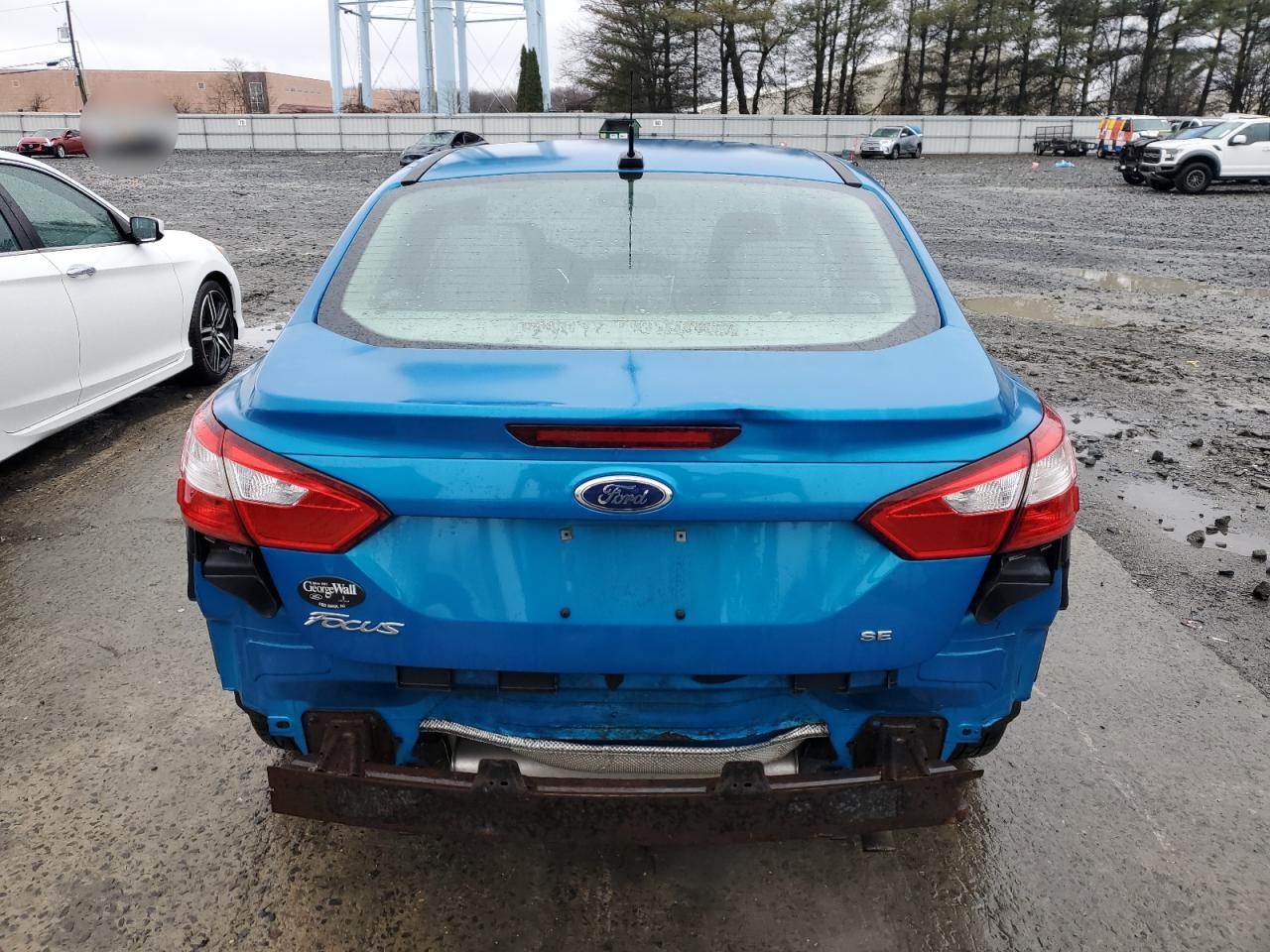 2013 Ford Focus VIN 1FADP3F24DL348871 Copart auction photo, rear end damage thumbnail 6