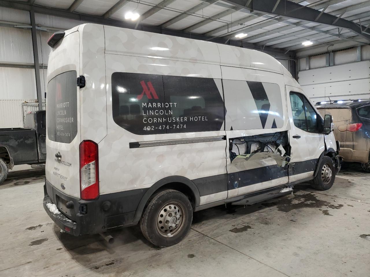 2022 Ford Transit VIN 1FDAX9XG6NKA77311 Copart auction photo, side / hail damage thumbnail 3