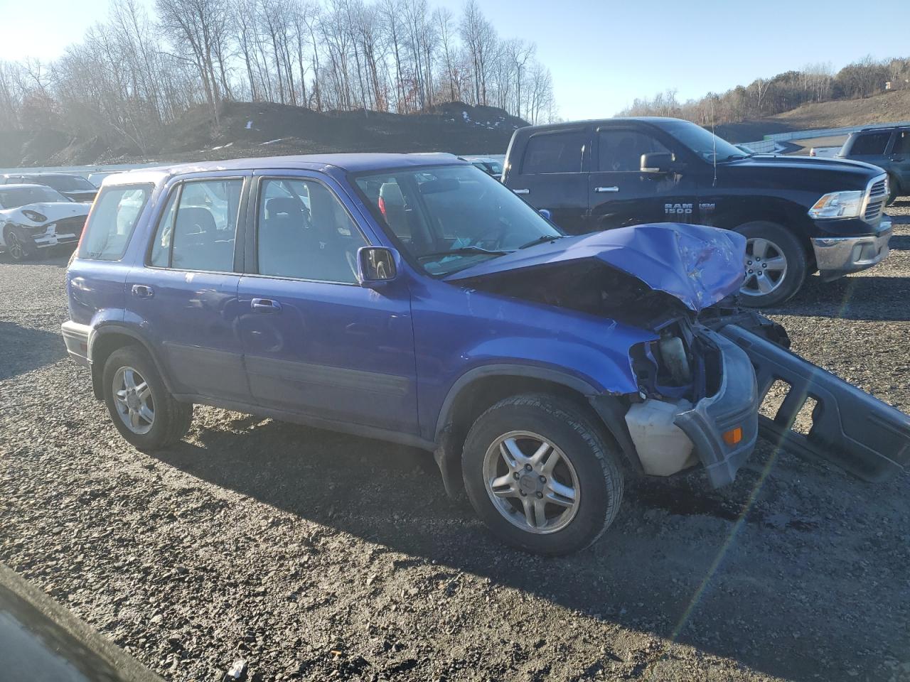 2000 Honda CR-V VIN JHLRD1865YC060234 Copart auction photo, front end / side damage thumbnail 4