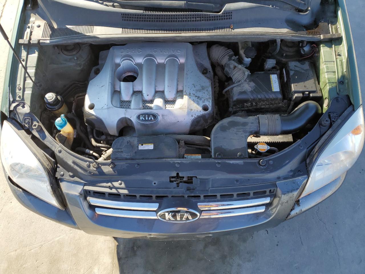 2005 KIA Sportage VIN KNDJF724857115374 Copart auction photo, rollover / all over damage thumbnail 12