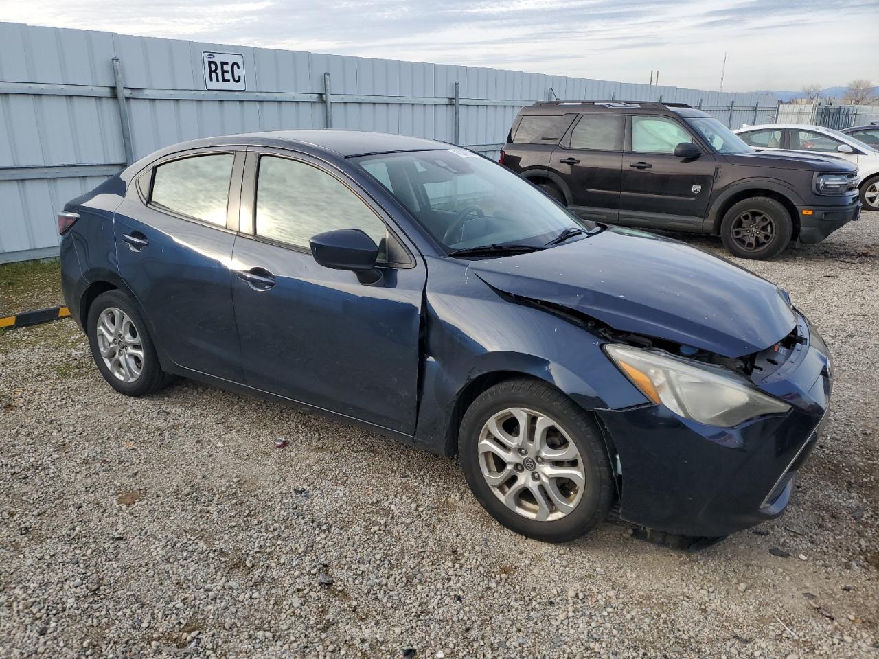2017 Toyota Yaris VIN 3MYDLBYV6HY155711 Copart auction photo, side / rear end damage thumbnail 4