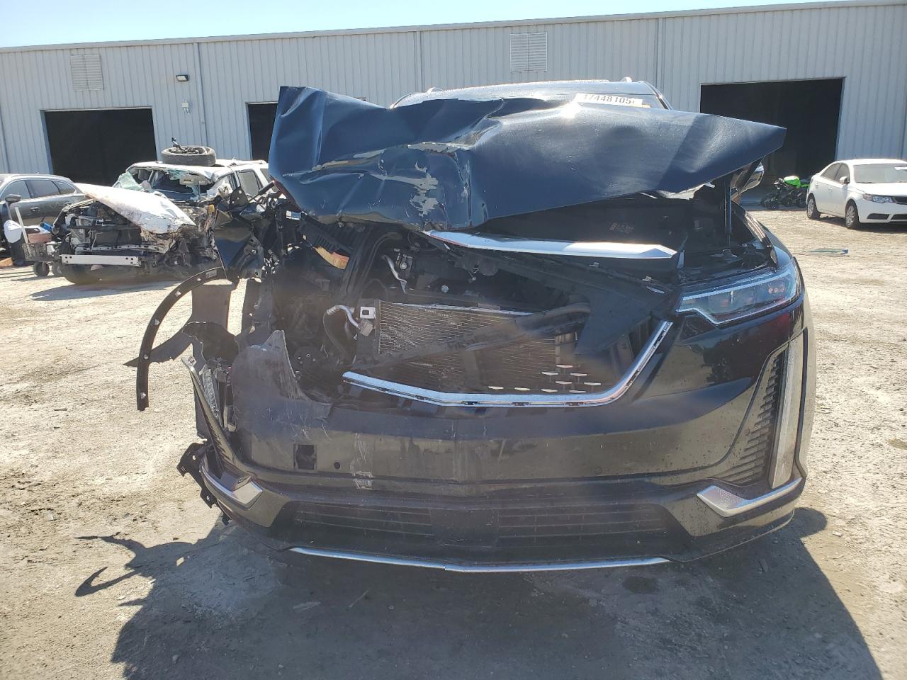 2020 Cadillac XT6 VIN 1GYKPDRS2LZ138648 Copart auction photo, front end damage thumbnail 5