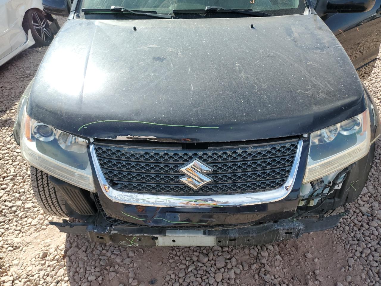 2011 Suzuki Grand Vitara VIN JS3TE0D20B4100834 Copart auction photo, front end damage thumbnail 12