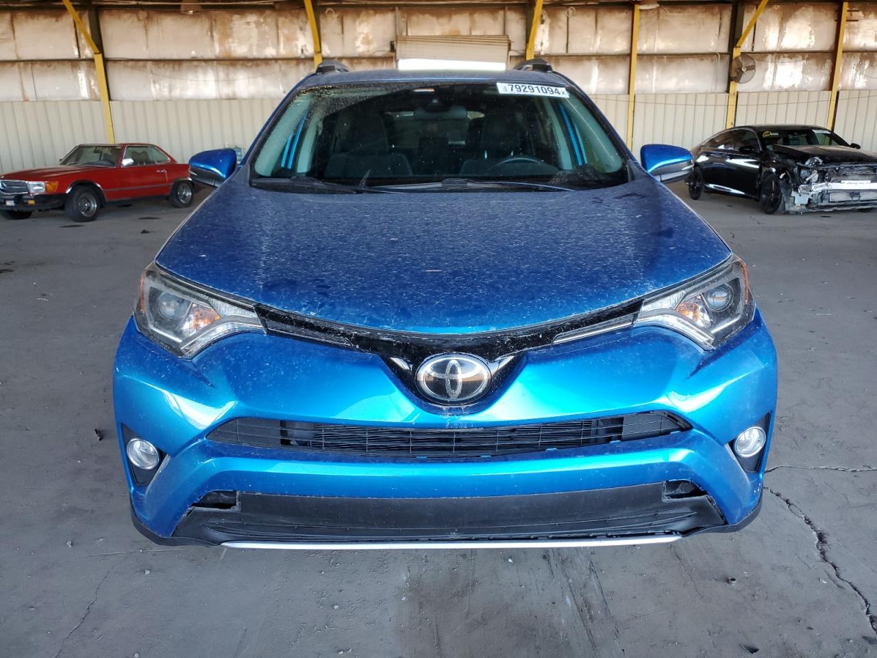 2017 Toyota RAV 4 VIN 2T3WFREV5HW385693 Copart auction photo, rear end damage thumbnail 5