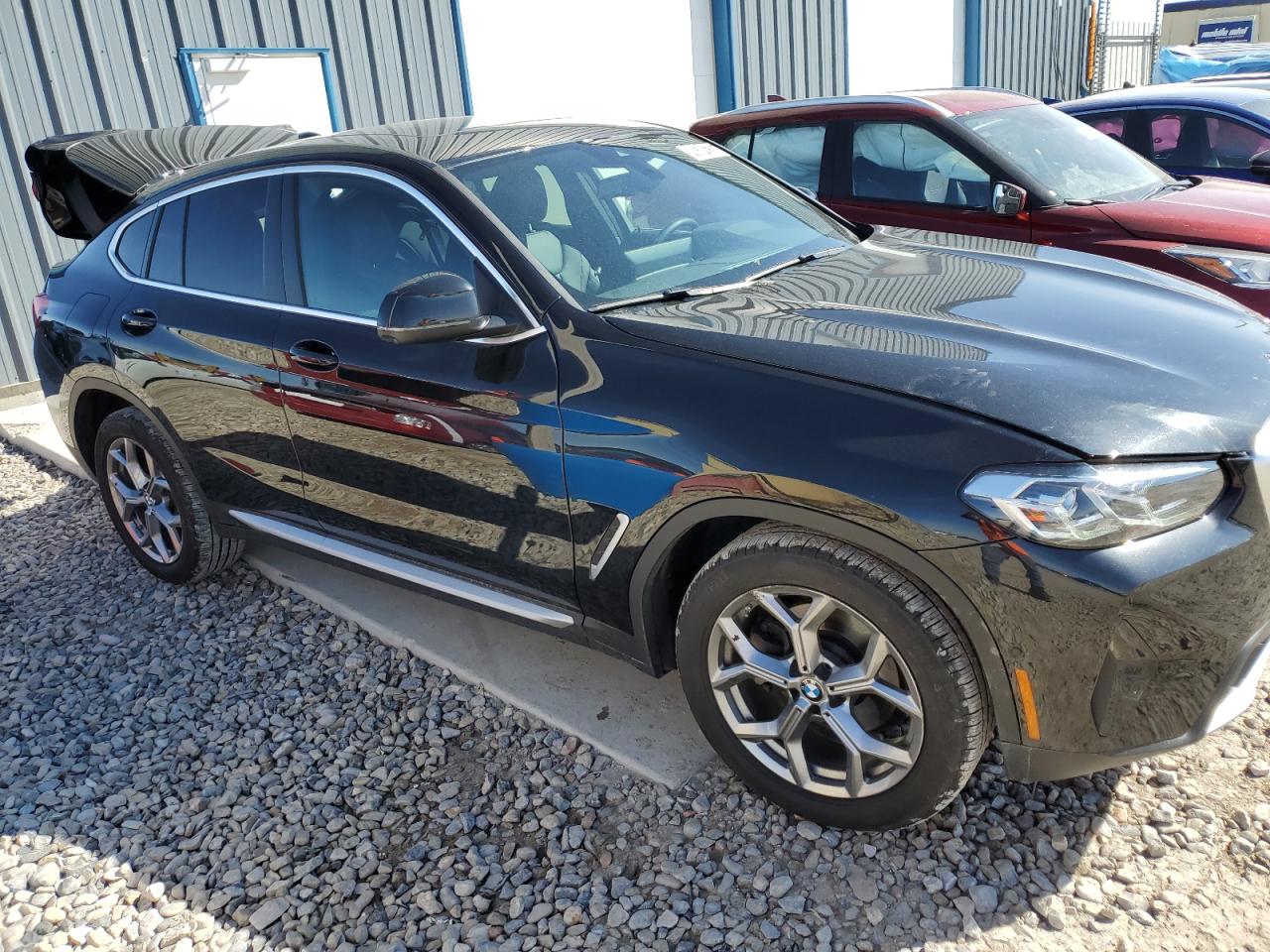 2024 BMW X4 VIN 5UX33DT03R9W66588 Copart auction photo, rear end damage thumbnail 4