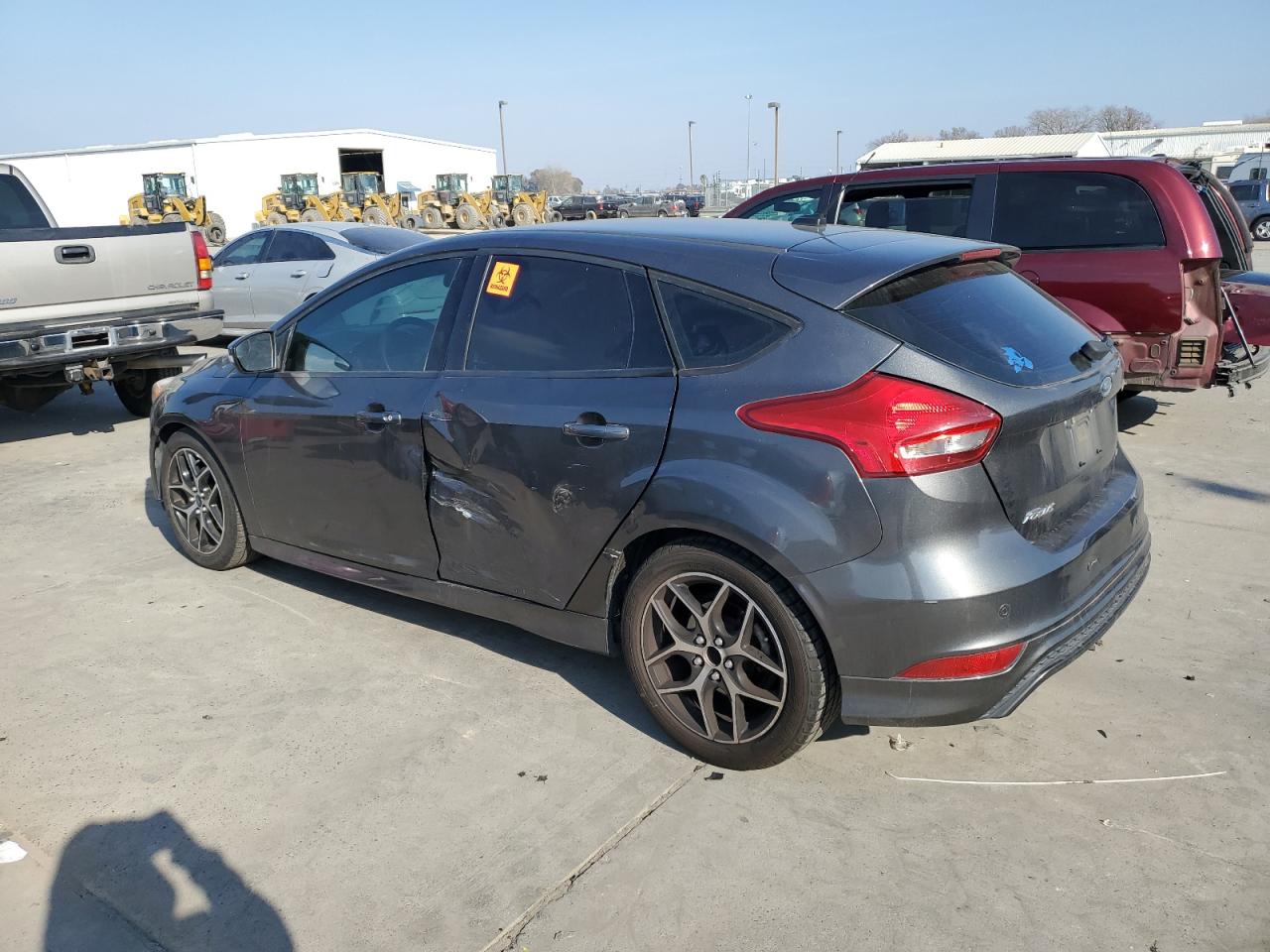 2015 Ford Focus VIN 1FADP3K2XFL306746 Copart auction photo, side / front end damage thumbnail 2