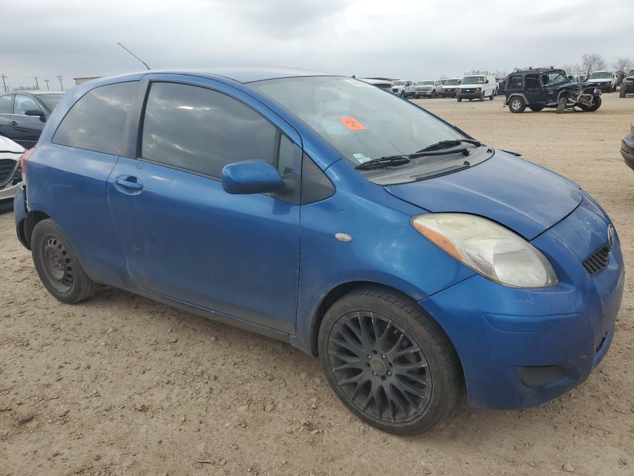 2010 Toyota Yaris VIN JTDJT4K34A5319948 Copart auction photo, all over damage thumbnail 4