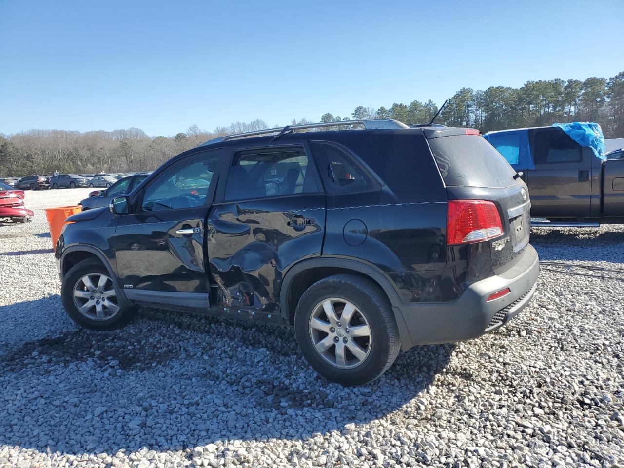 2012 KIA Sorento VIN 5XYKTCA66CG269283 Copart auction photo, side / front end damage thumbnail 2