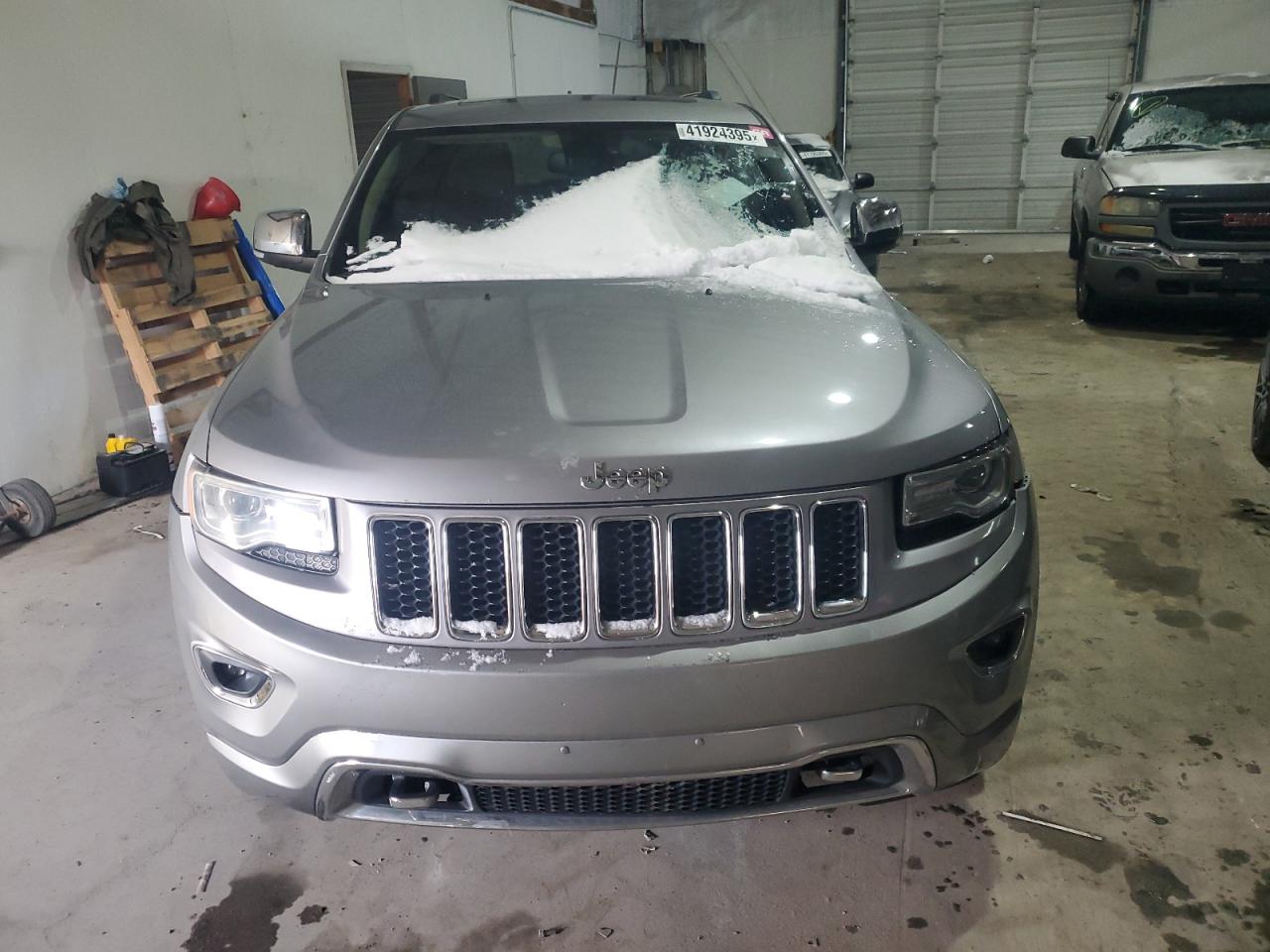 2015 Jeep Grand Cherokee VIN 1C4RJFCG7FC613773 Copart auction photo, mechanical / normal wear damage thumbnail 5
