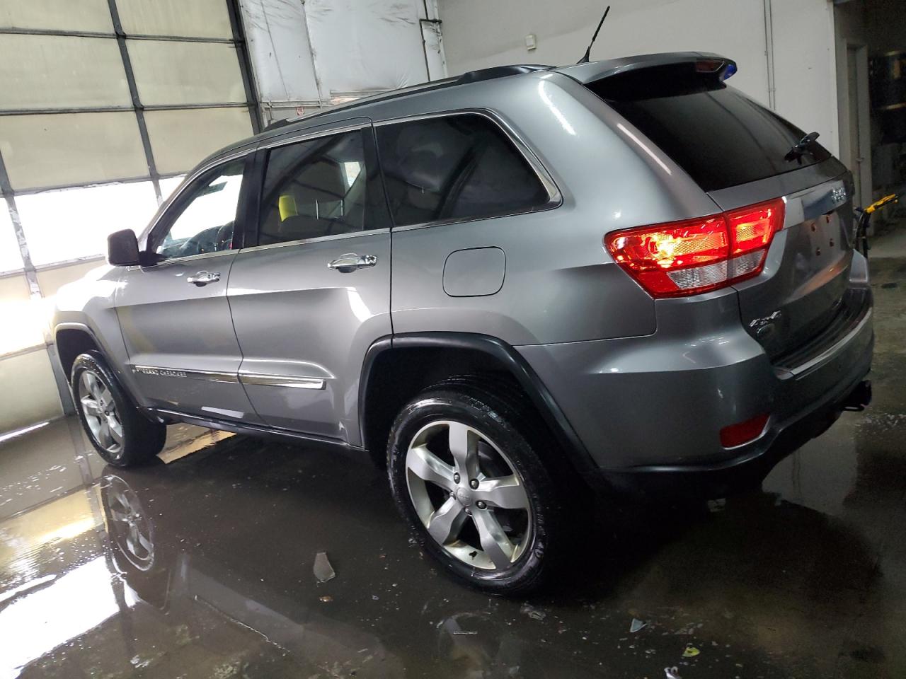 2012 Jeep Grand Cherokee VIN 1C4RJFCG6CC342314 Copart auction photo, rear end / side damage thumbnail 2