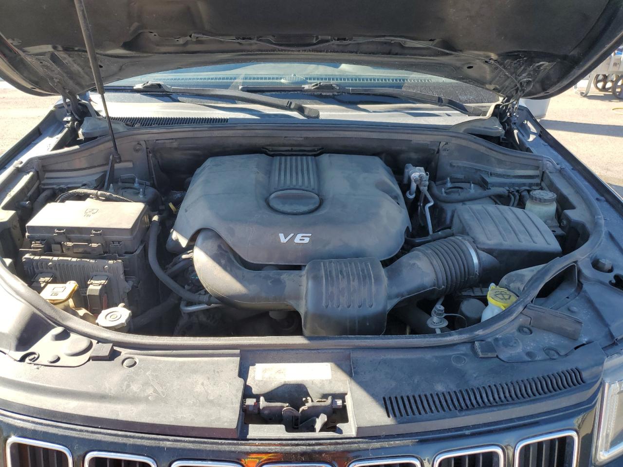 2014 Jeep Grand Cherokee VIN 1C4RJFBG5EC319885 Copart auction photo, rear end damage thumbnail 11