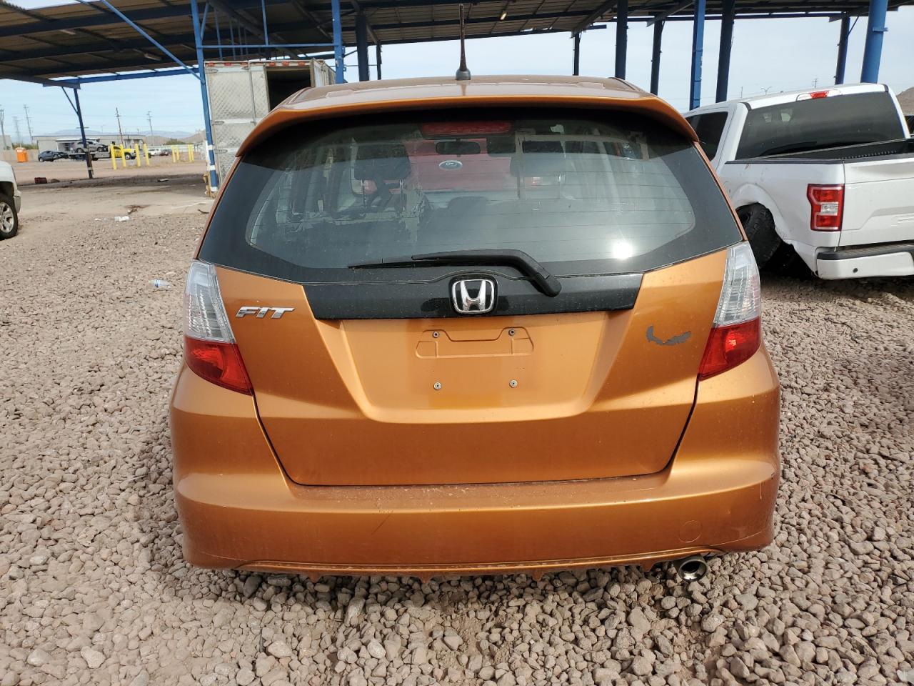 2010 Honda Fit VIN JHMGE8H43AS024089 Copart auction photo, side damage thumbnail 6