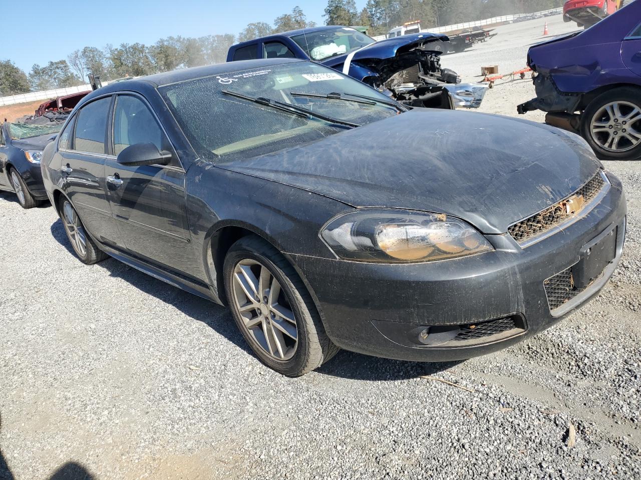 2012 Chevrolet Impala VIN 2G1WC5E33C1238833 Copart auction photo, water/flood damage thumbnail 4
