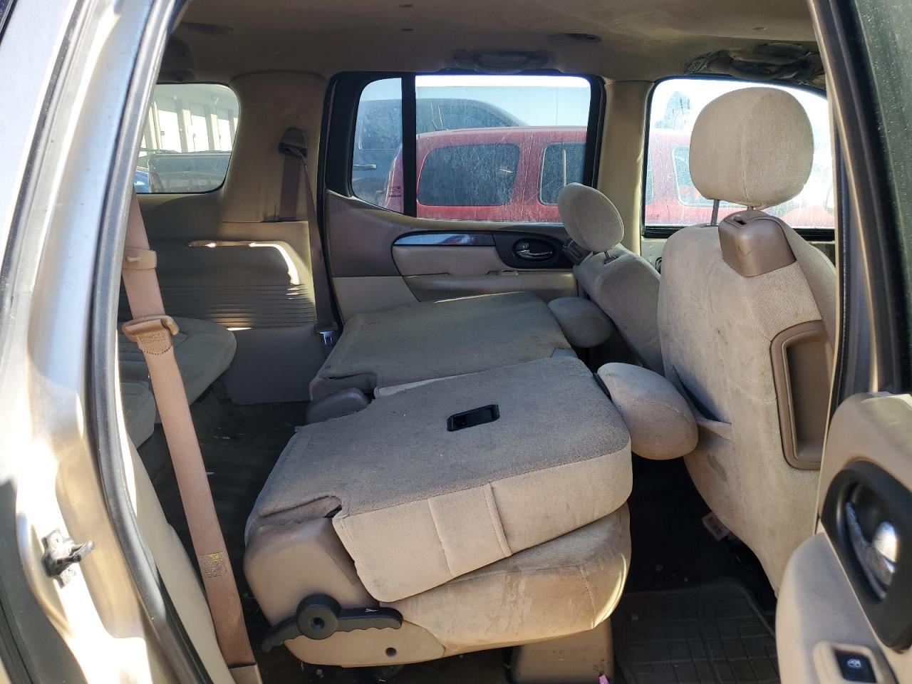 2004 GMC Envoy VIN 1GKET16S546133758 Copart auction photo, burn - engine damage thumbnail 10