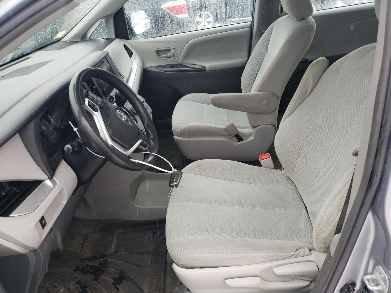 2015 Toyota Sienna VIN 5TDZK3DC0FS542129 Copart auction photo, front end / side damage thumbnail 7
