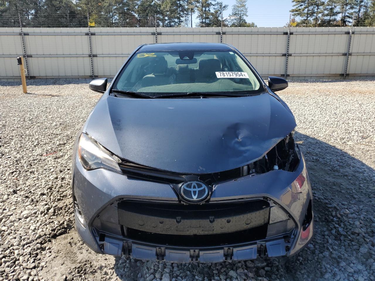 2018 Toyota Corolla VIN 5YFBURHE5JP855379 Copart auction photo, front end / minor dent/scratches damage thumbnail 5
