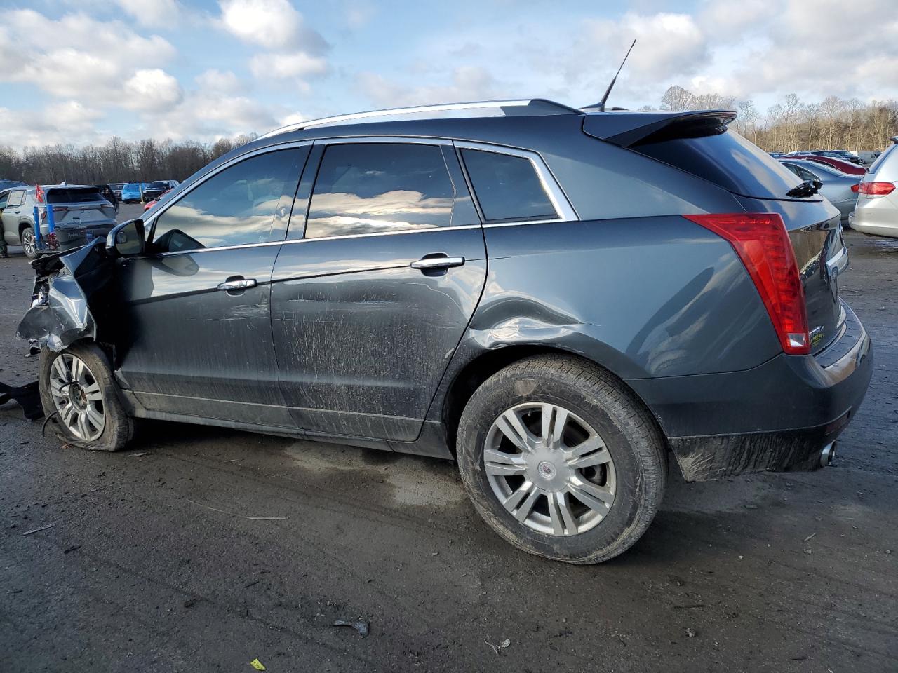 2012 Cadillac SRX VIN 3GYFNDE31CS576337 Copart auction photo, front end / side damage thumbnail 2