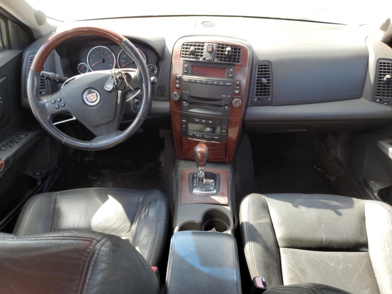 2006 Cadillac CTS VIN 1G6DP577360159569 Copart auction photo, side damage thumbnail 8
