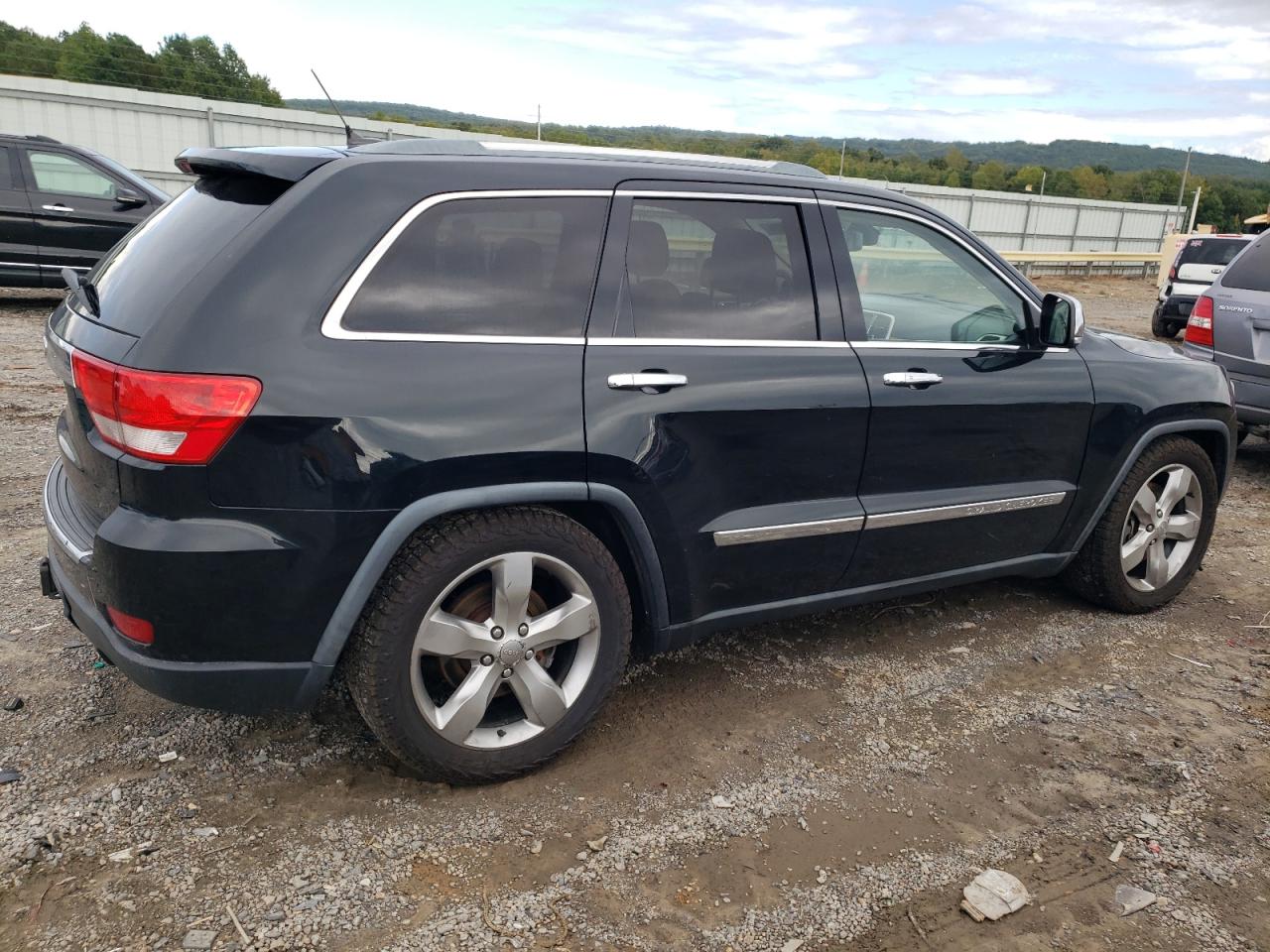 2012 Jeep Grand Cherokee VIN 1C4RJFCT0CC228645 Copart auction photo, front end / undercarriage damage thumbnail 3