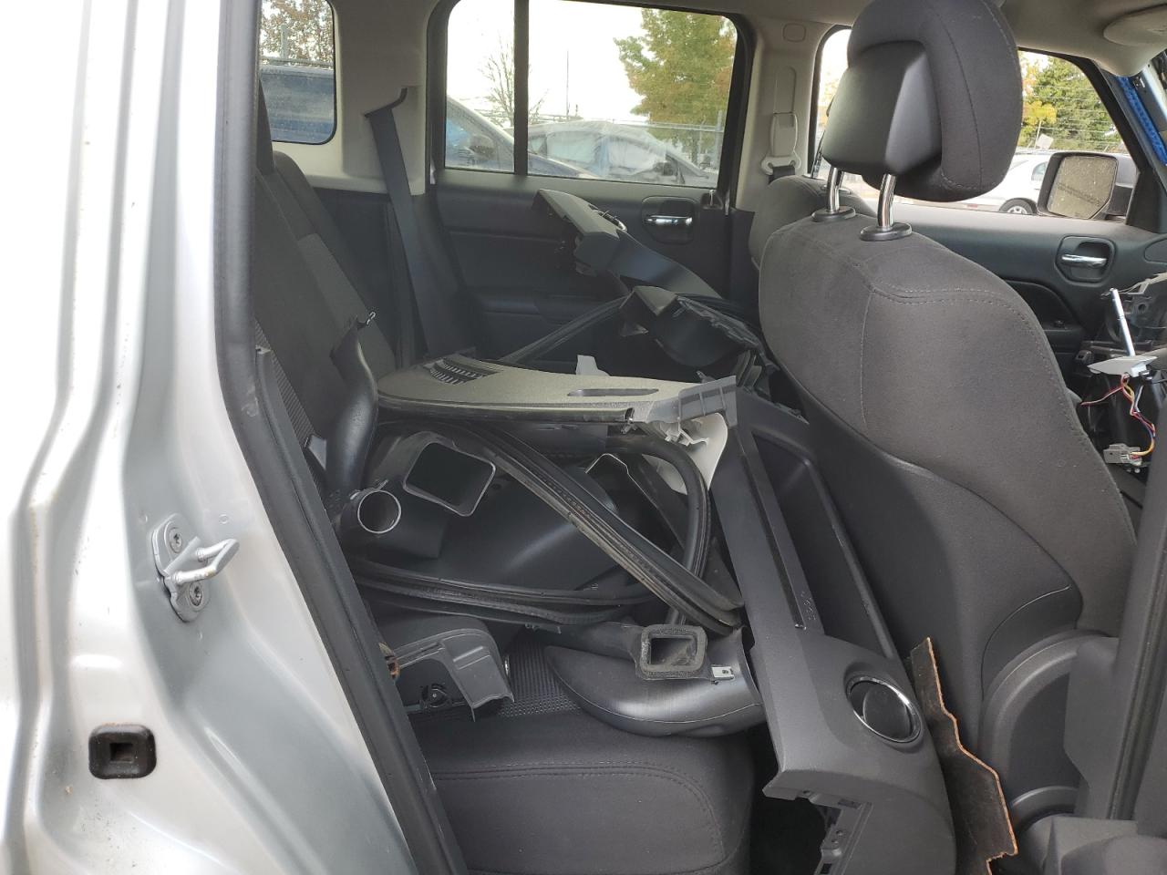 2011 Jeep Liberty (Patriot) VIN 1J4NF1GB0BD283474 Copart auction photo, stripped damage thumbnail 11