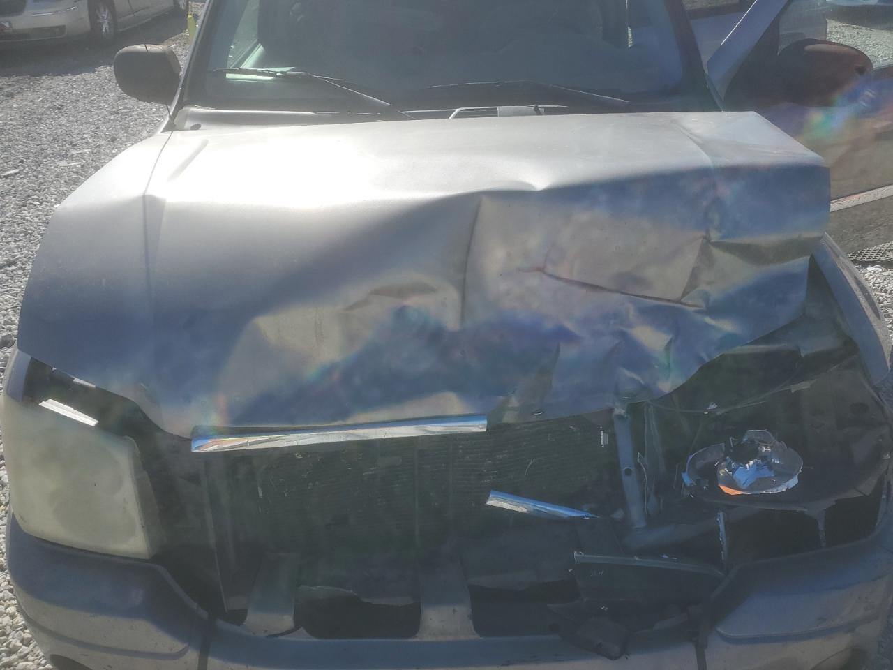 2006 GMC Envoy VIN 1GKDS13S662184697 Copart auction photo, front end damage thumbnail 13