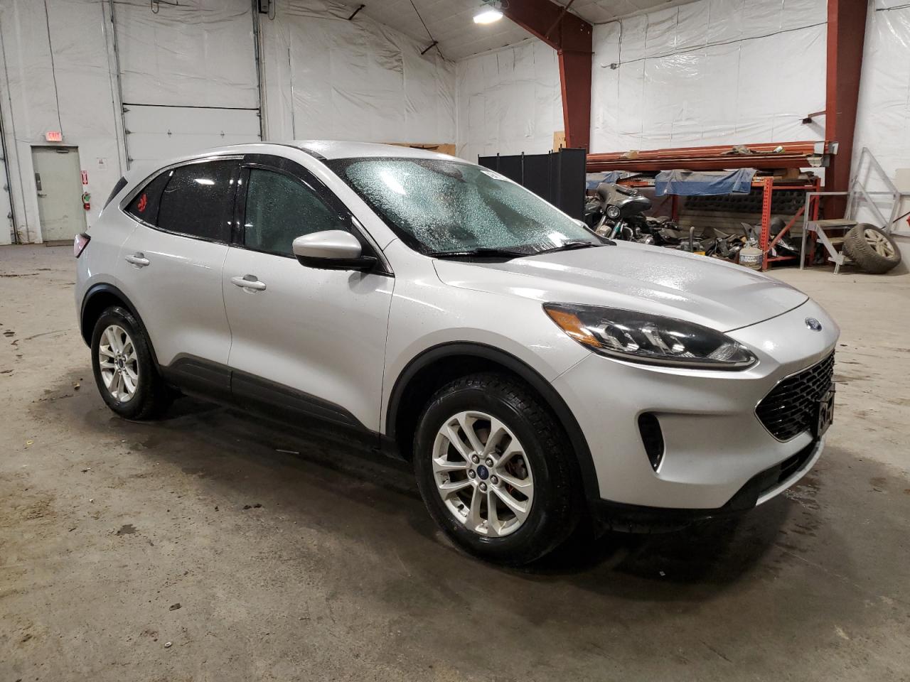 2020 Ford Escape VIN 1FMCU9G69LUC25638 Copart auction photo, side / rear end damage thumbnail 4