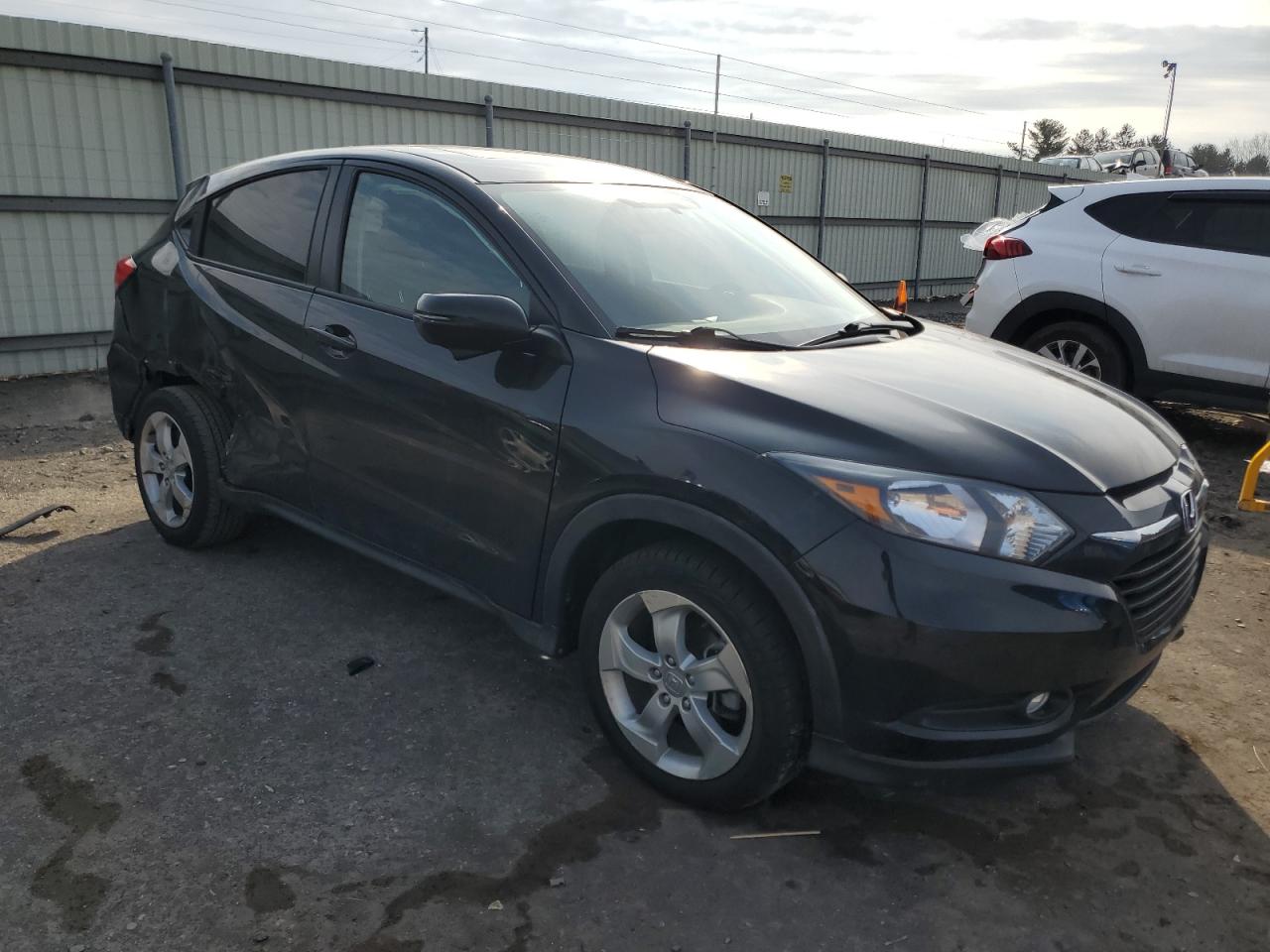 2016 Honda HR-V VIN 3CZRU6H54GM748427 Copart auction photo, side / rear end damage thumbnail 4