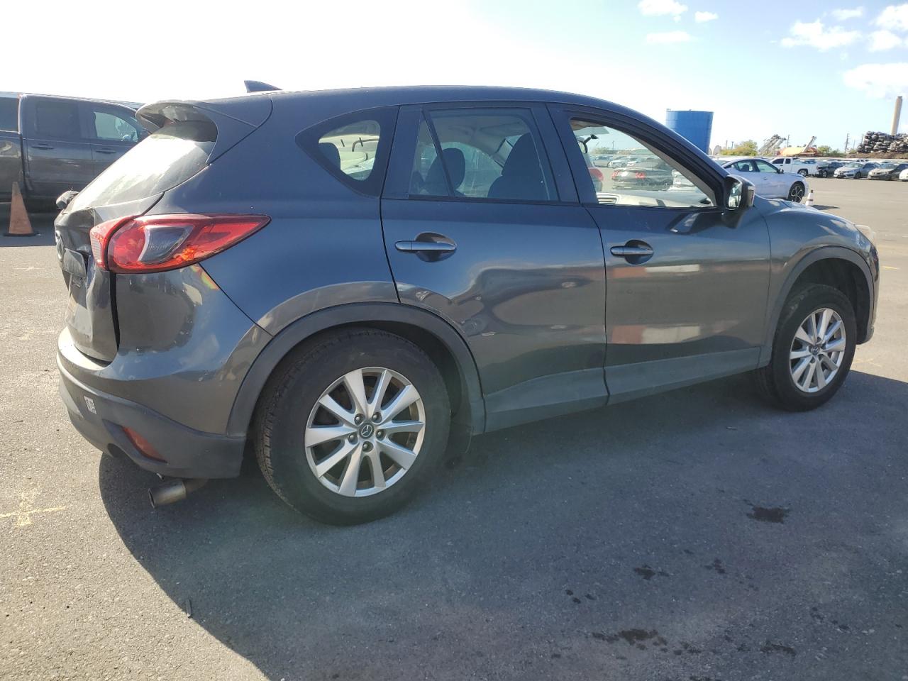 2016 Mazda CX-5 VIN JM3KE2BY3G0664111 Copart auction photo, side / mechanical damage thumbnail 3