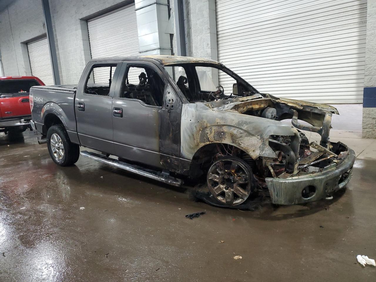 2014 Ford F-150 VIN 1FTFW1ET4EKF75179 Copart auction photo, burn damage thumbnail 4