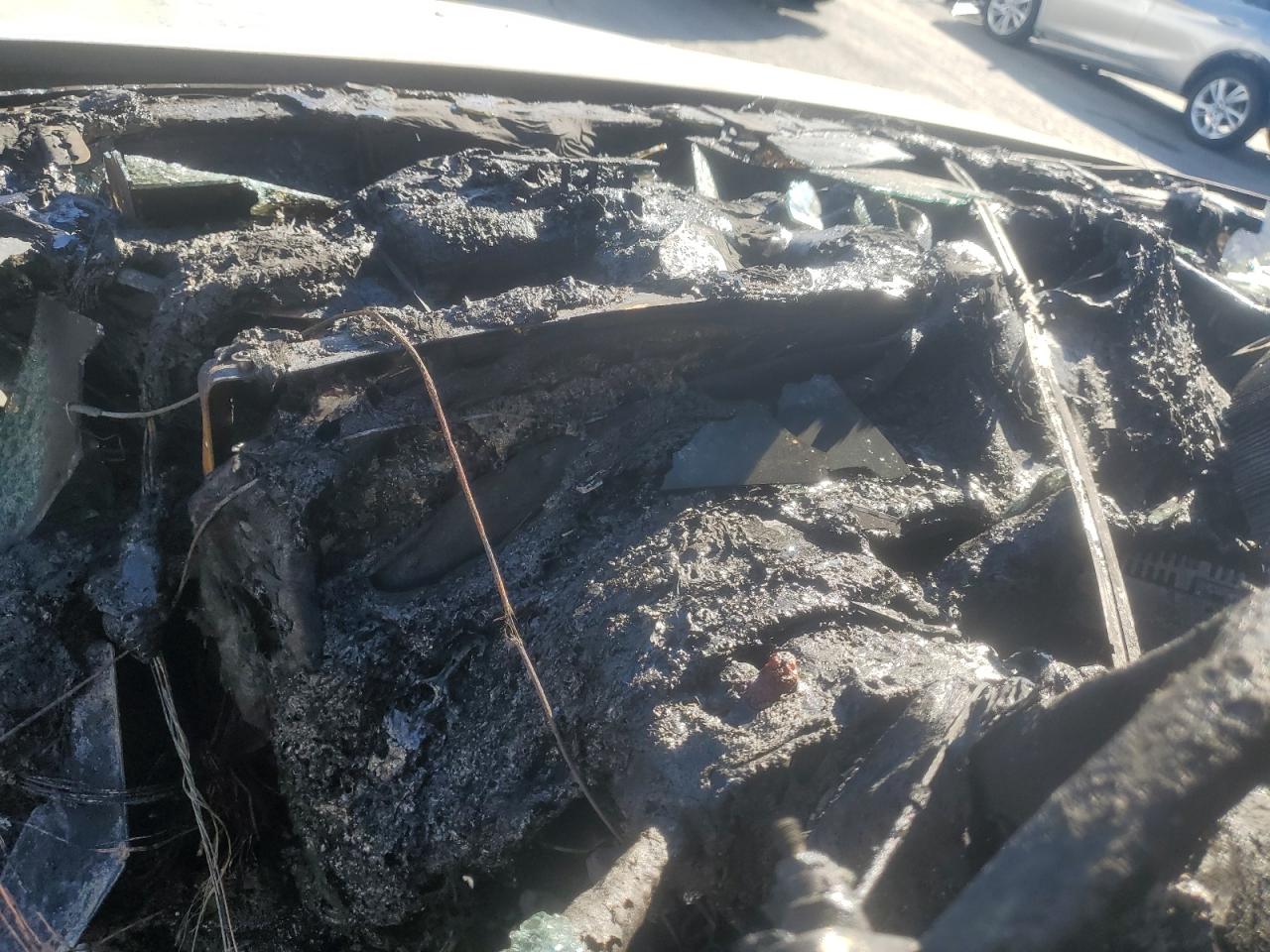 2002 Chevrolet Tahoe VIN 1GNEC13T82R134706 Copart auction photo, burn damage thumbnail 9