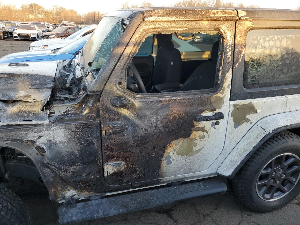 2021 Jeep Wrangler VIN 1C4GJXAN6MW741870 Copart auction photo, burn damage thumbnail 7