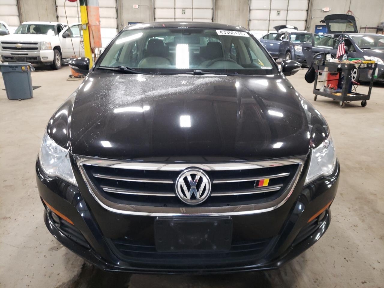 2009 Volkswagen Passat CC VIN WVWHL73C49E514619 Copart auction photo, rear end damage thumbnail 5