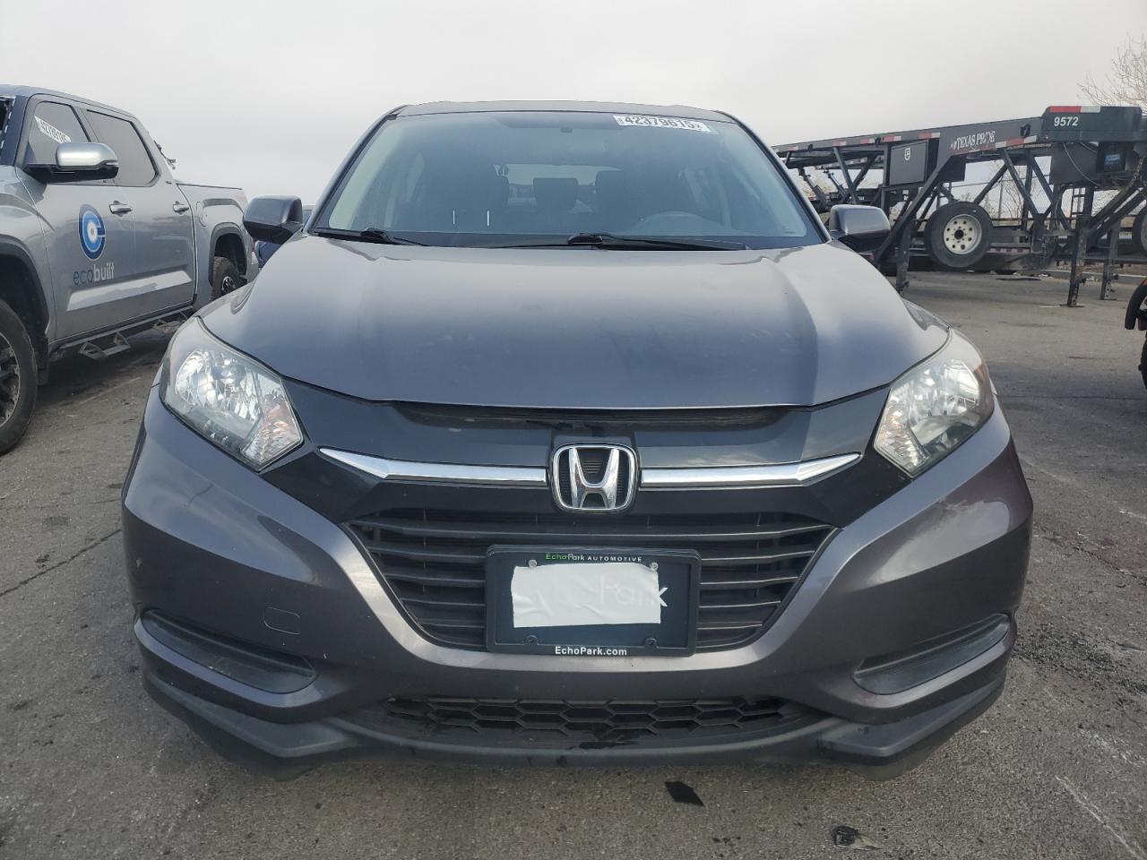 2017 Honda HR-V VIN 3CZRU5H31HG700327 Copart auction photo, side damage thumbnail 5