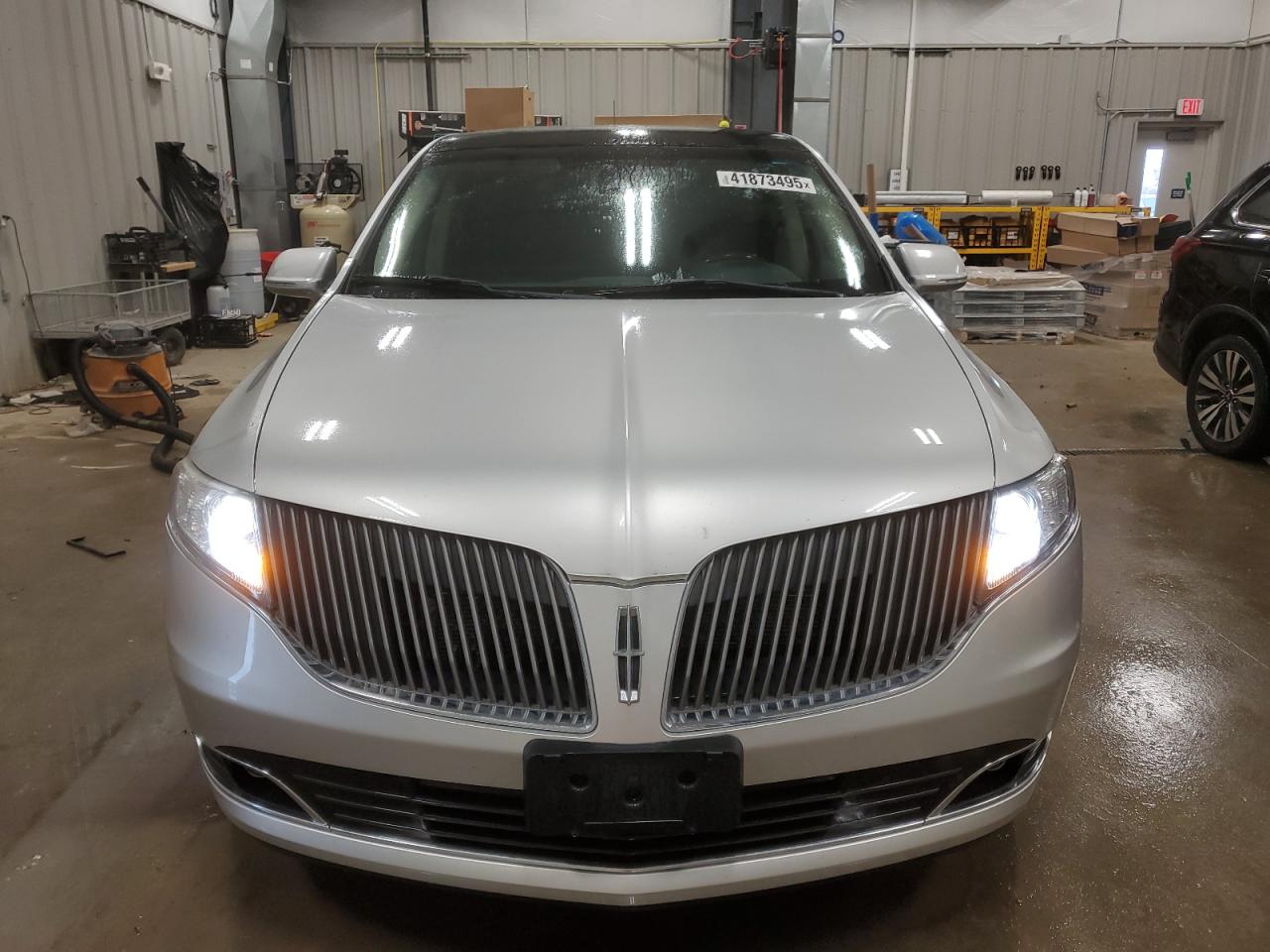 2016 Lincoln MKT VIN 2LMHJ5AT5GBL01426 Copart auction photo, rear end damage thumbnail 5