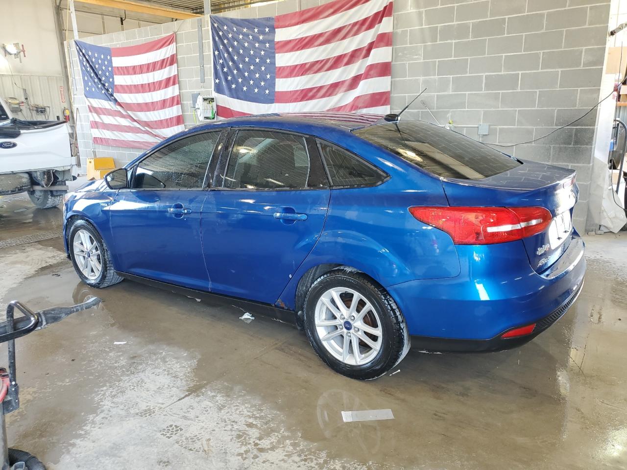 2018 Ford Focus VIN 1FADP3F22JL204585 Copart auction photo, front end / minor dent/scratches damage thumbnail 2