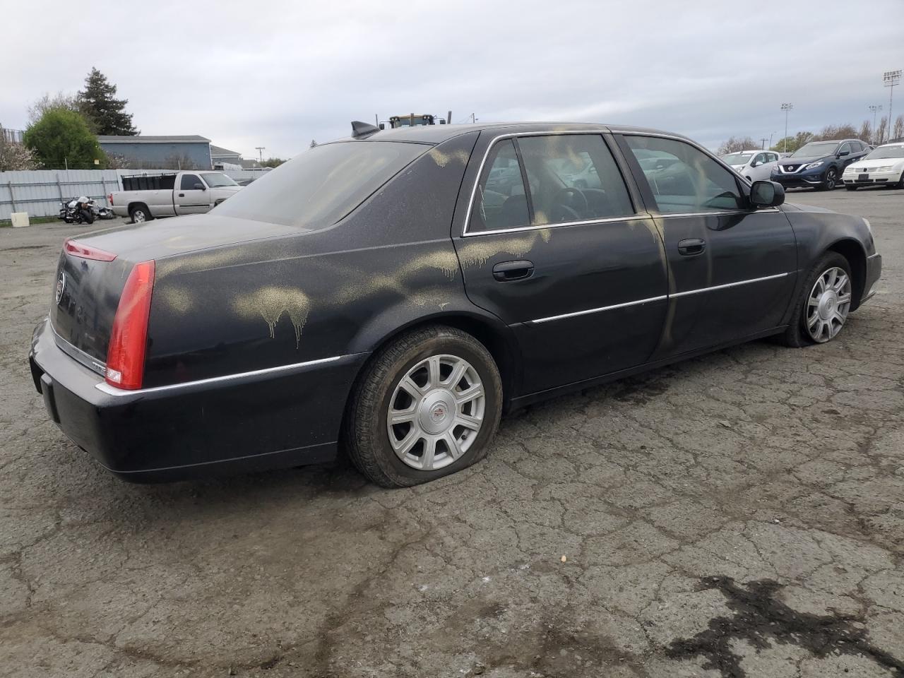2010 Cadillac DTS VIN 1G6KA5EY7AU116648 Copart auction photo, vandalism damage thumbnail 3