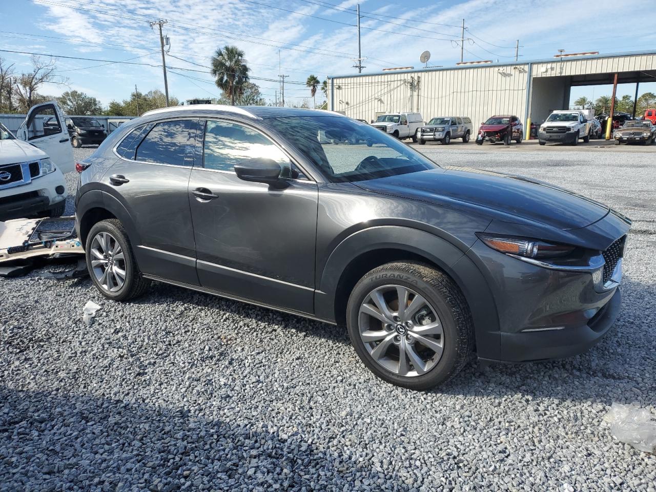 2022 Mazda CX-30 VIN 3MVDMBDL3NM446166 Copart auction photo, side / front end damage thumbnail 4