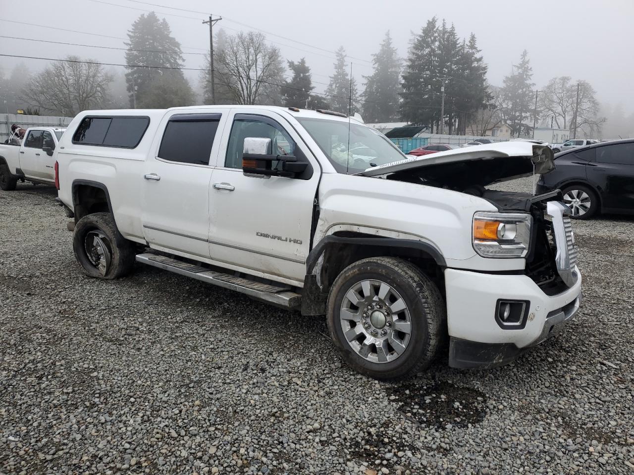 2017 GMC Sierra VIN 1GT12UEY5HF222224 Copart auction photo, side / front end damage thumbnail 4