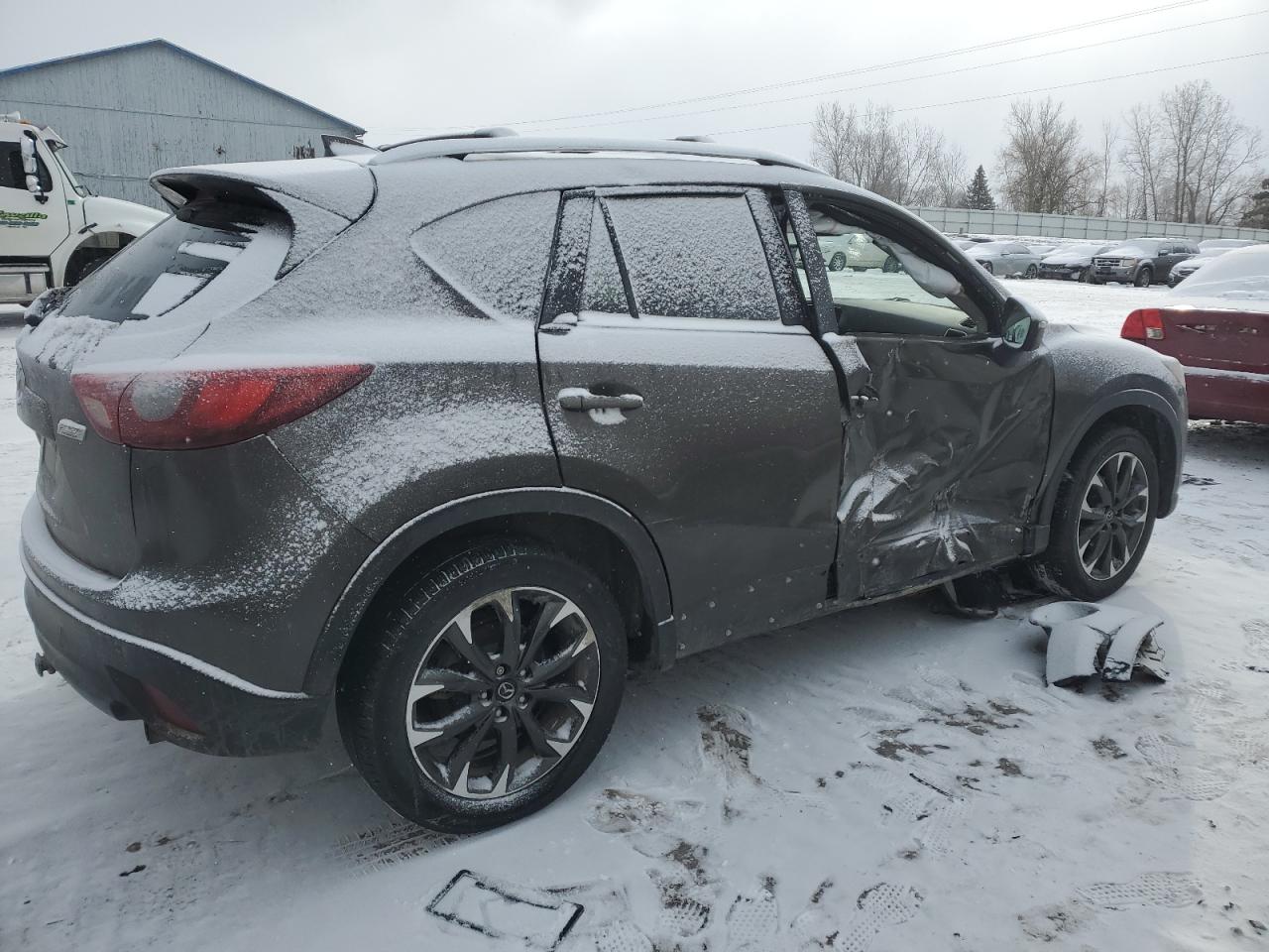 2016 Mazda CX-5 VIN JM3KE4DY0G0690643 Copart auction photo, side damage thumbnail 3