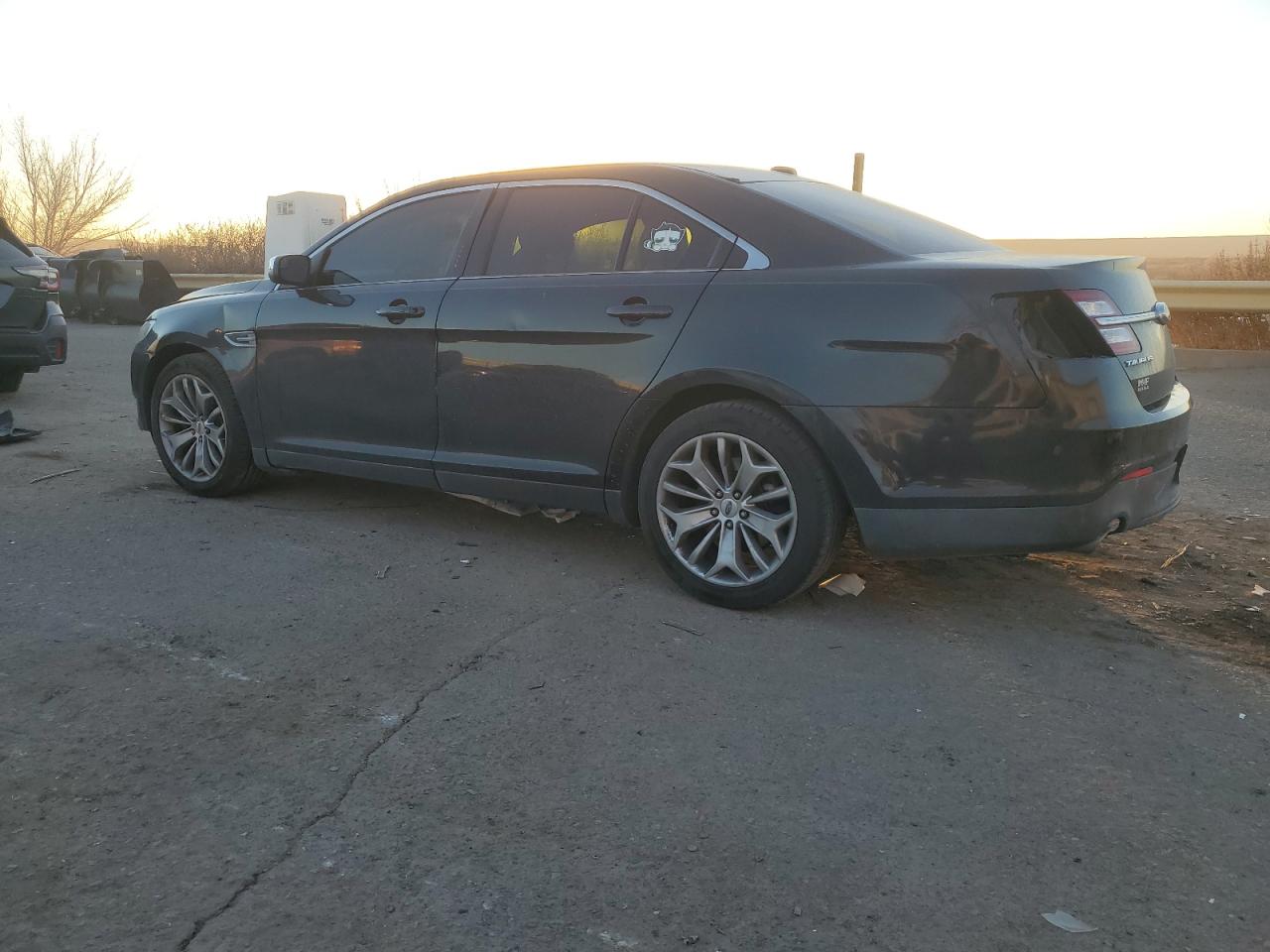 2015 Ford Taurus VIN 1FAHP2F88FG144487 Copart auction photo, side / rear end damage thumbnail 2
