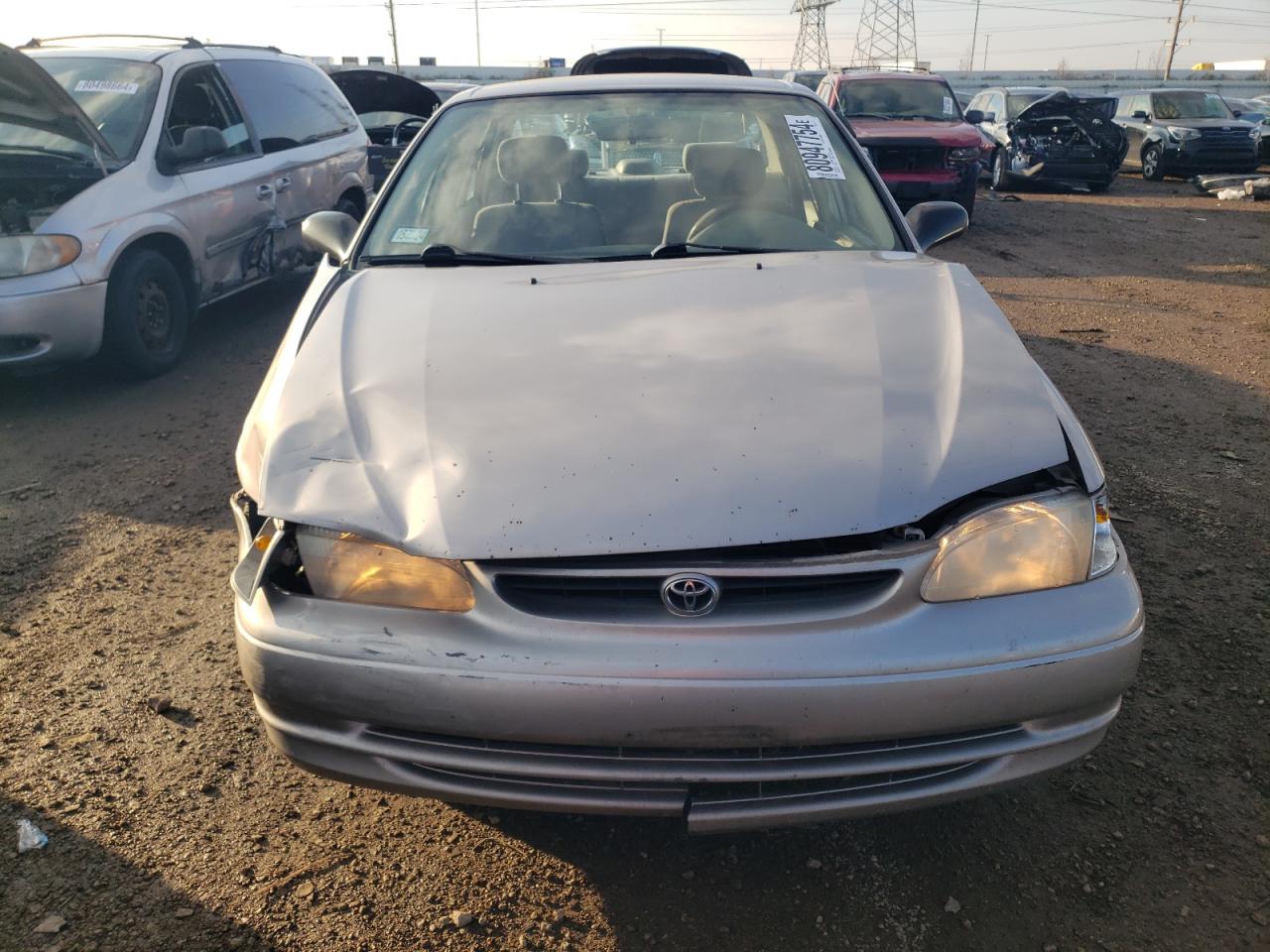 2000 Toyota Corolla VIN 2T1BR12E6YC368178 Copart auction photo, all over damage thumbnail 5