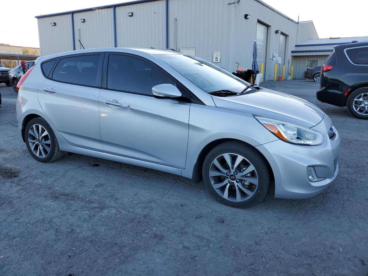 2015 Hyundai Accent VIN KMHCU5AE0FU201483 Copart auction photo, side damage thumbnail 4