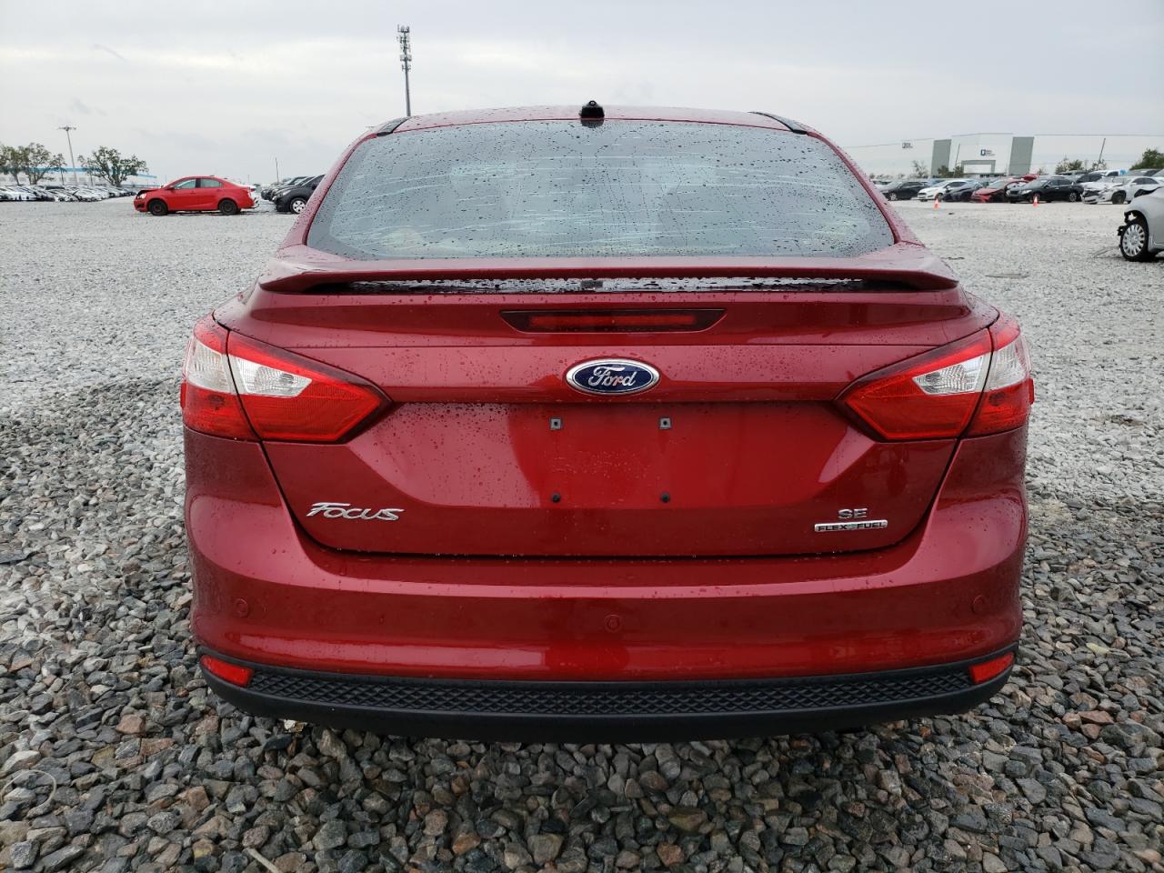 2014 Ford Focus VIN 1FADP3F2XEL403566 Copart auction photo, side / minor dent/scratches damage thumbnail 6