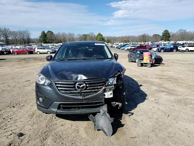 2016 Mazda CX-5 VIN JM3KE2DY4G0873726 Copart auction photo, front end / minor dent/scratches damage thumbnail 12